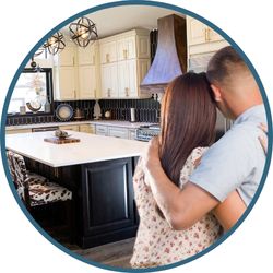 Young couple looking at their dream kitchen